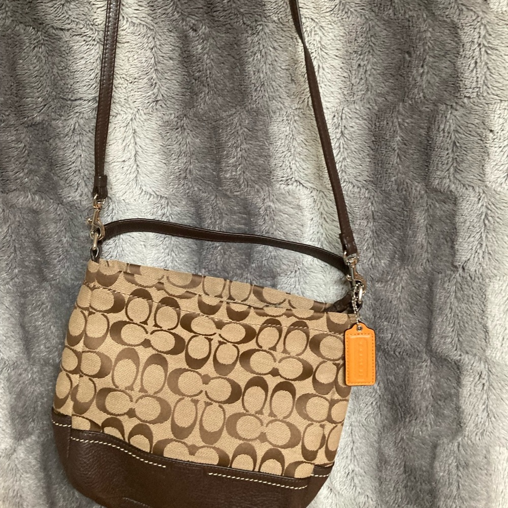 Brown coach purse, wristlet, wallet snd lanyard. All never used.